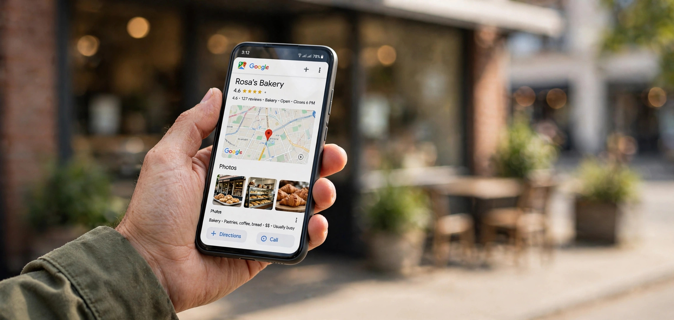 Google Business Profile listing for a new company on a phone